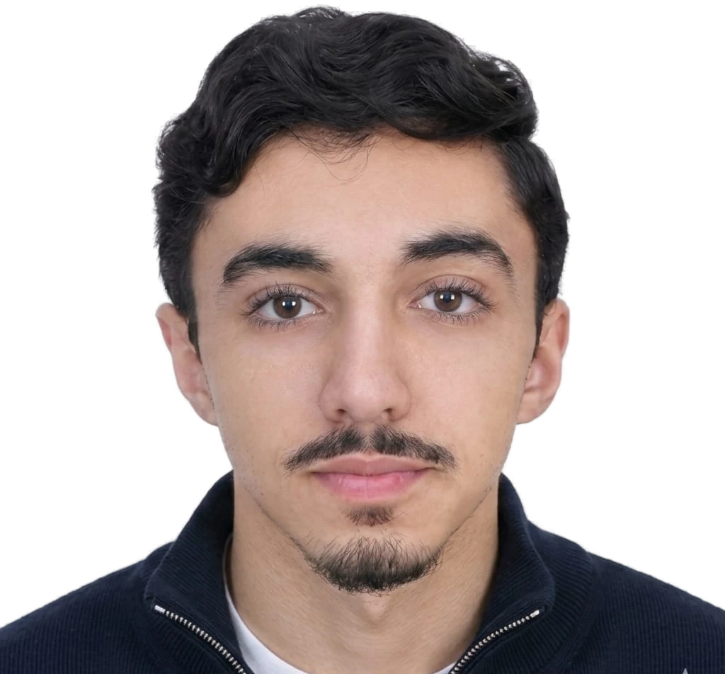 Portrait of Aymane looking straight at the camera